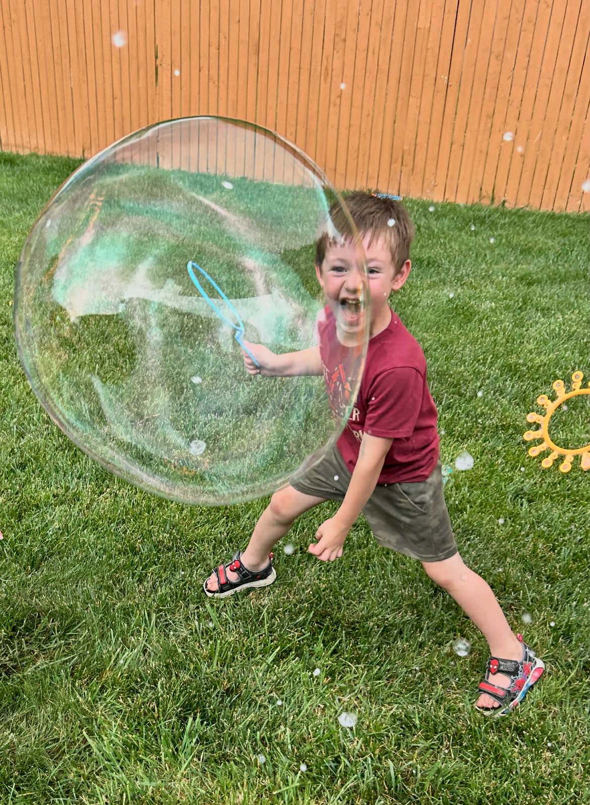 Child playing with bubbles